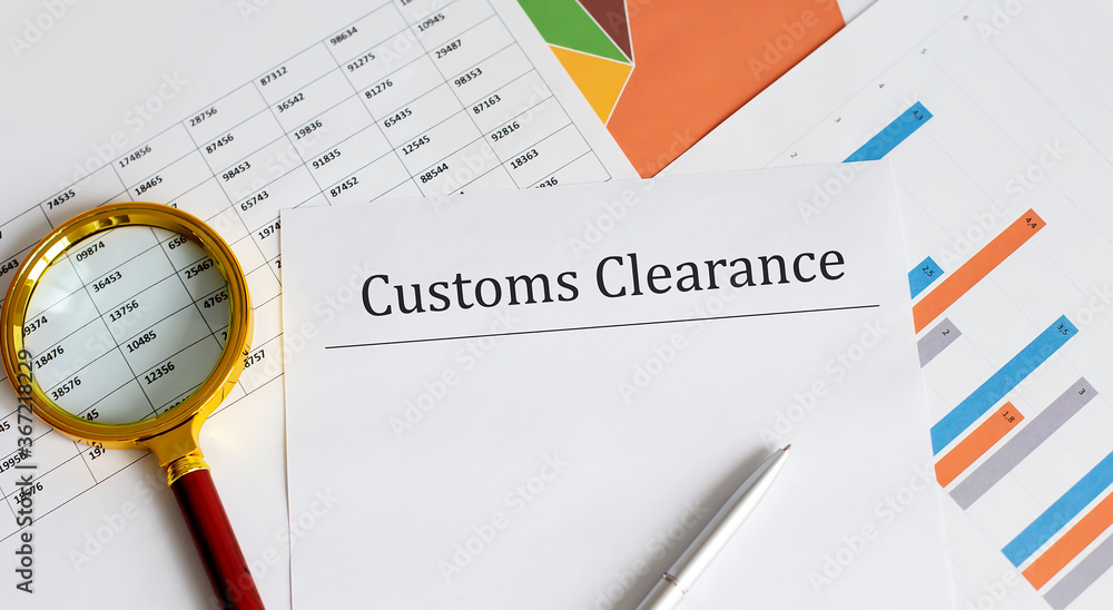 Aufkleber paper with customs clearance on a table with chart