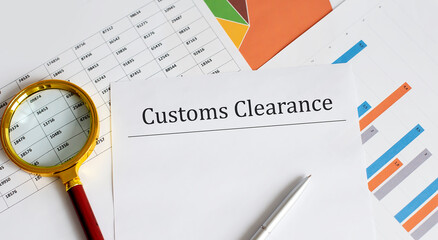 Paper with Customs Clearance on a table with chart