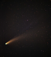 Comet Neowise C/2020 F3 with a tail against the background of outer space - observation at night on...