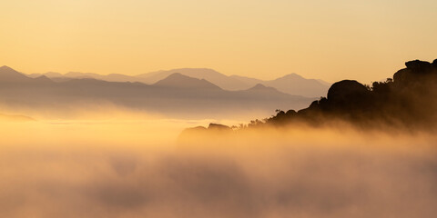 Early morning cloud top panorama view towards the San Gabriel Mountains from Rocky Peak Park...