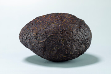 Mature avocado (Persea americana) on table