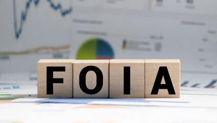 Page with FOIA The Freedom of Information Act on the table with stethoscope, medical concept.