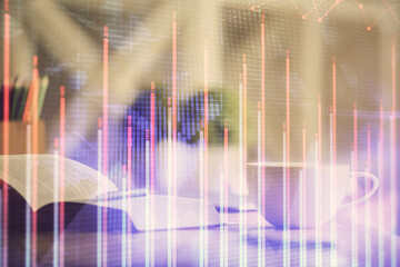 Multi exposure of forex graph drawing and desktop with coffee and items on table background. Concept of financial market trading