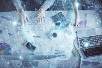 Double exposure of man and woman working together and human brain hologram drawing. Brainstorm concept. Computer background. Top View.