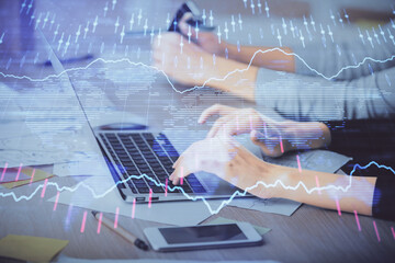 Multi exposure of woman hands typing on computer and financial chart hologram drawing. Stock market analysis concept.