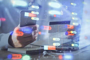 Double exposure of man hands holding a credit card and data theme drawing. E-commerce and technology concept.