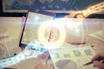 Fototapeta premium Double exposure of man's hands holding and using a phone and crypto currency blockchain theme drawing.