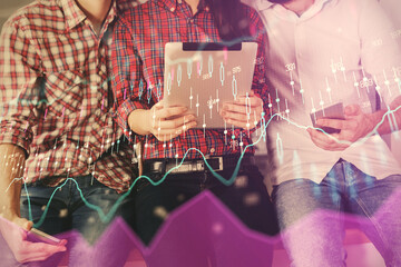 Double exposure of forex graph drawing and man and woman working together holding and using a mobile device. Trade concept.