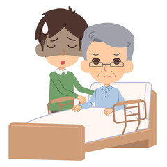 介護で疲れている男性