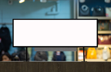 mockup white poster stand in front of blur background for show or present promotion product concept