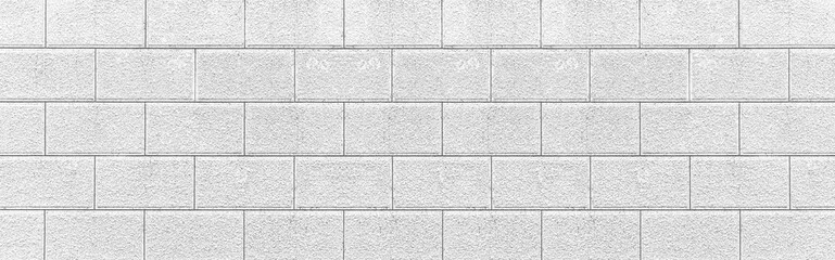 Panorama of Outdoor white stone block wall seamless background and pattern texture