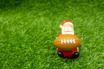 Christmas Holiday for Soccer with American Football on green grass