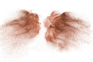 Golden colored sand splash against white background. 