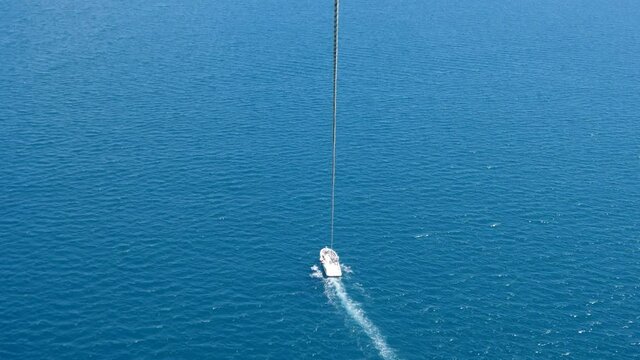 Okinawa,Japan-July 20, 2020: Parasailing on blue sky background at Miyakojima island
