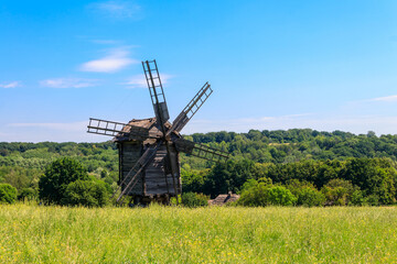 Plakat Old wooden windmill in Pyrohiv (Pirogovo) village near Kiev, Ukraine