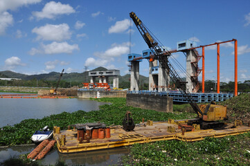 cleaning water hyacinth in the sengguling dam