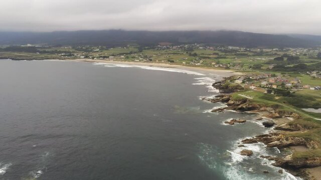 Beautiful beach of Galicia,Spain in cloudy day. Aerial Drone Video