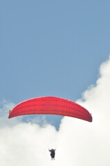 paragliding flying in the sky
