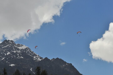 paragliding flying in the sky