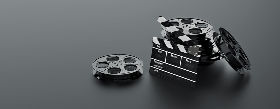 35mm Black movie reels and clapperboard on a dark background. 3D illustration, rendering