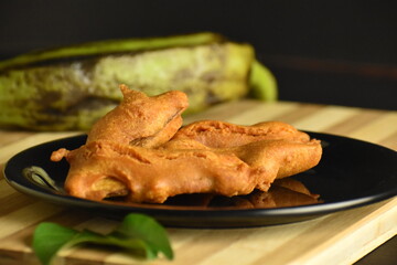 Closeup picture of South India evening  snack called bajji made of raw Banana on the Table