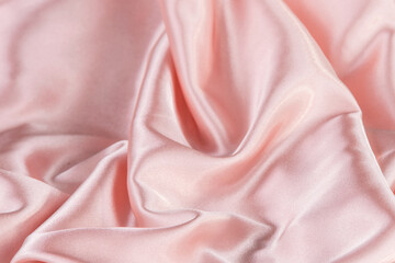 Obraz premium Close up. Pink silk wrinkle fabric texture.