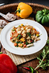 Crab meat fried bell pepper on the wooden background.