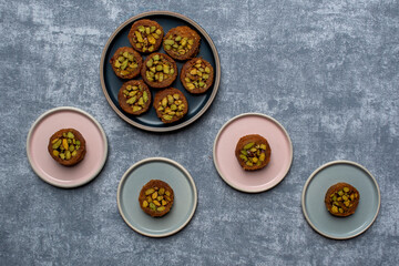 Arabic dessert or Sweets MABROUME with Pistachios.top view