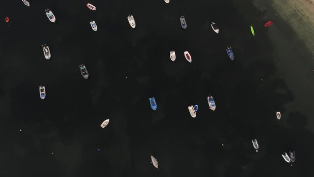Boats Moored in coastal village of Galicia,Spain. Aerial Drone Video