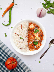 A very famous Indian dish of Paneer Butter Masala & Basmati Rice.