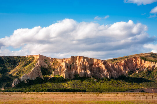 Clay Cliffs are a geological wonder with sharp pinnacles and ridges on Henburn Road in Central Otago - New Zealand, South Island.