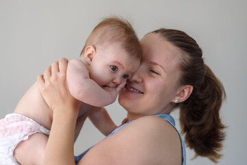 Mother with baby daughter