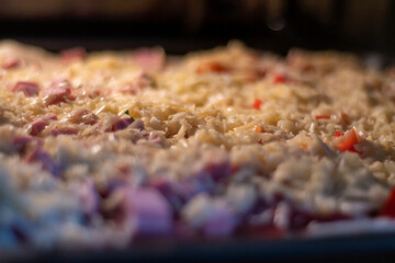 Background with surface of homemade pizza in the oven