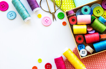 Sewing accessories on a white background