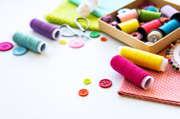 Sewing accessories on a white background