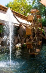 Fototapeta na wymiar water mill and fountain
