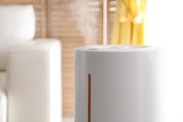 Modern air humidifier at home, closeup view