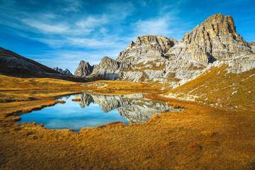 Mountain lake near Tre Cime di Lavaredo peaks, Dolomites, Italy