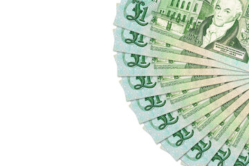 Guernsey pound banknotes illustrating economy and investment with copyspace to the left