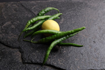 Nimbu mirchi is a indian way to keep negative energy and negativity away from people. It is widely used across india in different ways.