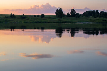 Fototapeta na wymiar Beautiful and colorful sunset on a lake in Siberia, Russia