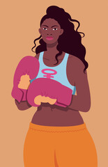 Beautiful black woman with long curly hair wearing boxing gloves and tank top with pink female symbol 