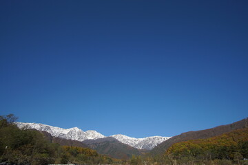 typical mountain landscape of Japanese alps in Hakuba at early Autumn