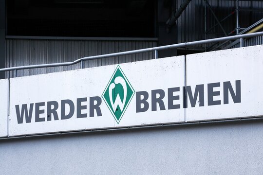 Bremen, Germany - July 22, 2018: Werder Bremen sign on a wall at the weser stadium. Werder Bremen is a German sports club best known for its association football team