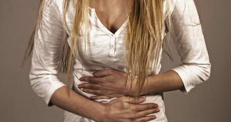 Naklejka premium The woman's belly pain. PMS symptoms, menstruation suffer problem.