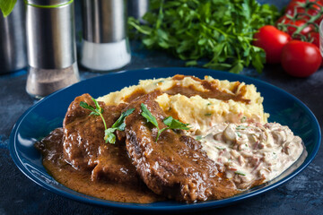 Stewed pork neck with potatoes and sauce