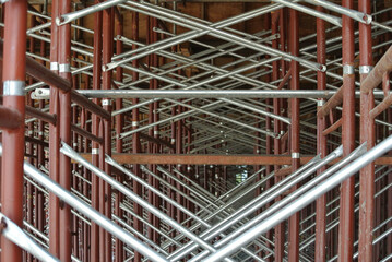 JOHOR, MALAYSIA -APRIL 13, 2016: Scaffolding used as the temporary structure to support platform, form work and structure at the construction site. Also used it as a walking platform for workers. 

