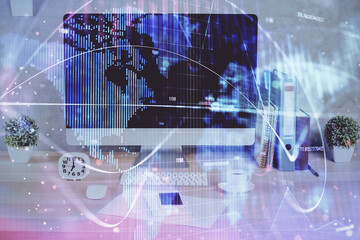 Double exposure of business theme icons and work space with computer background. Concept of success.