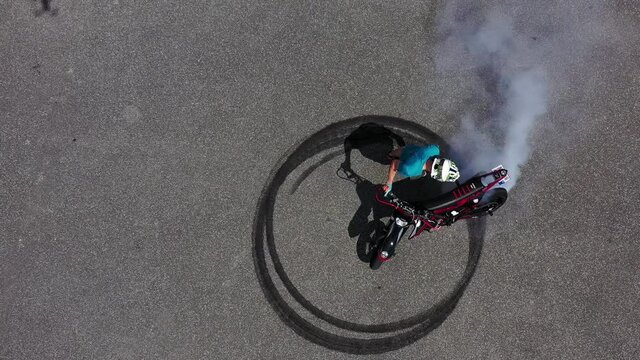 Aerial view of a lot of smoke from a motorcycle
