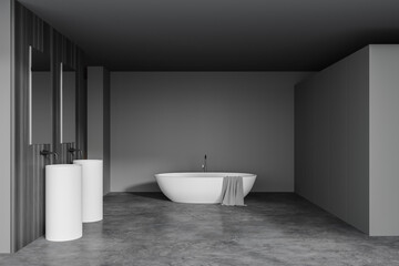 Obraz na płótnie Canvas Grey and wooden bathroom interior, tub and sink